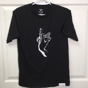 Black Diamond shirt with a hand holding a diamond